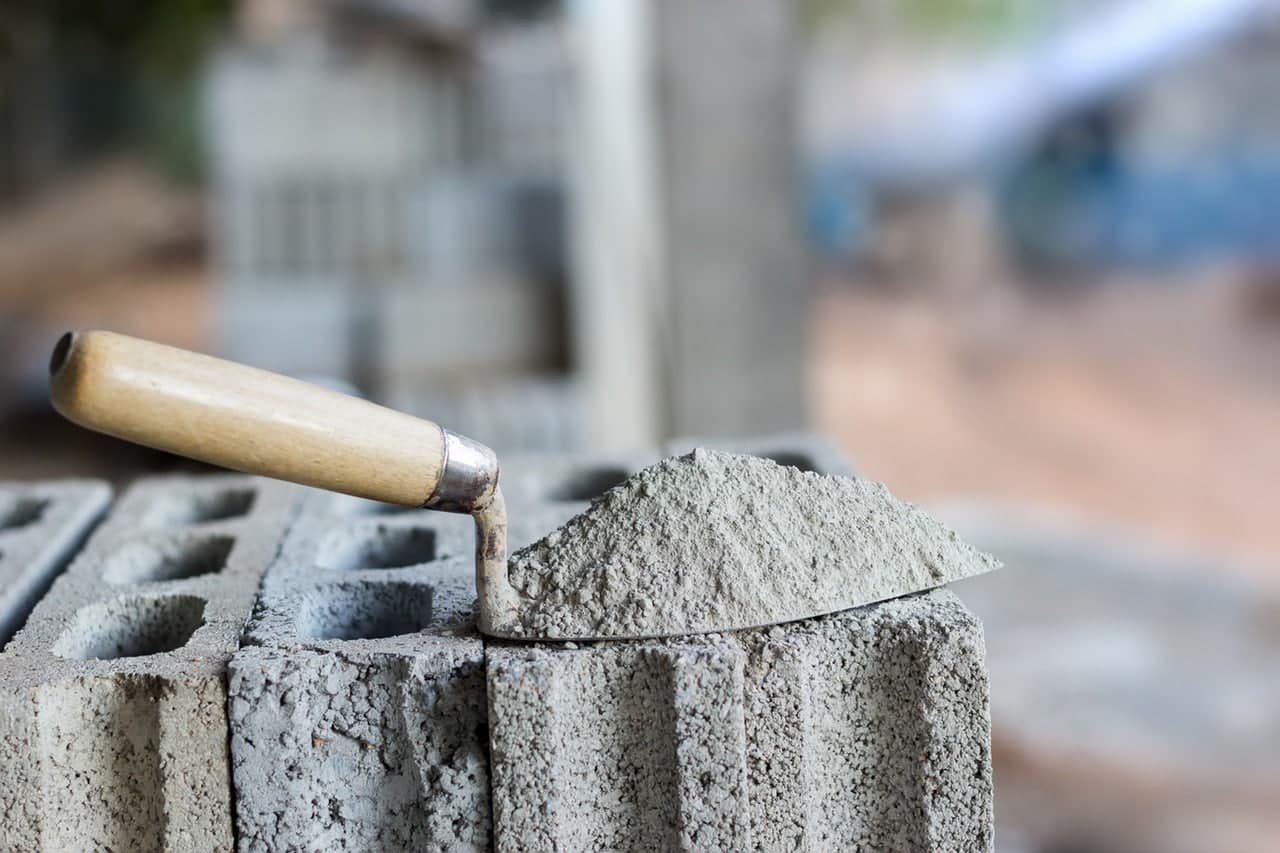 Economists warn of higher cement prices after new sales quota decision.
