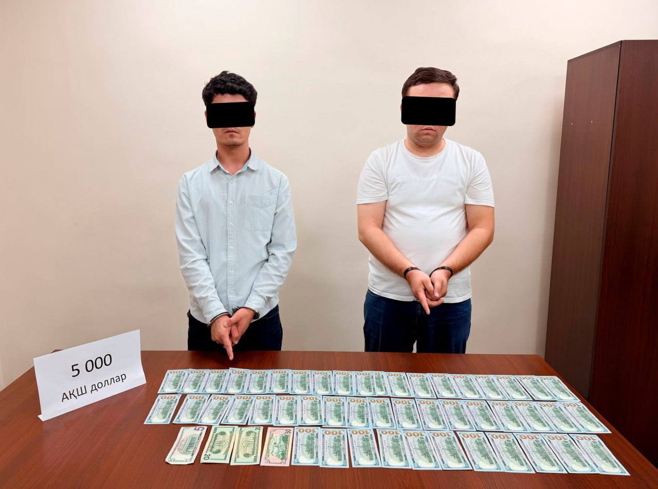 Two Tashkent tax inspectors caught taking $5,000 bribe.
